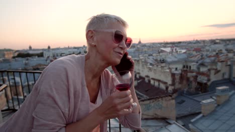 Blonde-Woman-Spending-Leisure-Time-on-Roof