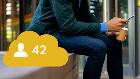 Man-sitting-on-a-brick-platform-checking-his-phone-4k