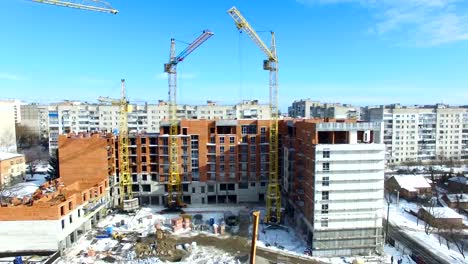 Construction-crane-and-skyscraper