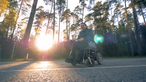 Handicapped-man-is-sitting-in-a-wheelchair-outside