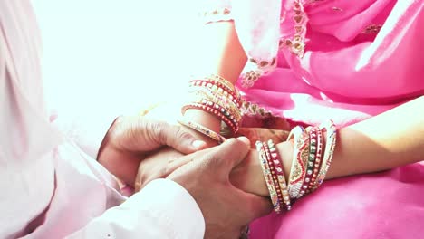 Beautiful-couple-enjoying-a-romantic-camel-ride-and-holding-hands