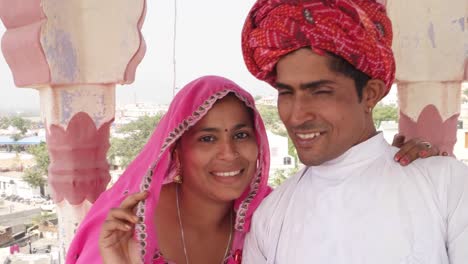 POV-of-selfie-stick-camera-taking-photo-and-video-of-Indian-bride-and-groom-in-India