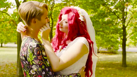 Lesbian-wedding.-The-bride-and-groom-are-hugging-each-other-and-talking