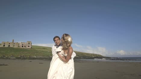 Smiling-newlyweds-running-to-the-camera