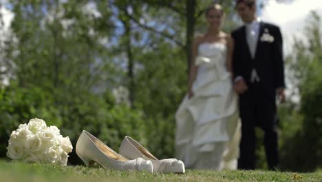 Bride-and-groom-walking-outside-on-a-sunny-day