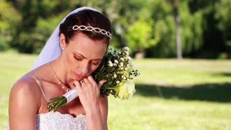 Upset-bride-sitting-on-the-grass