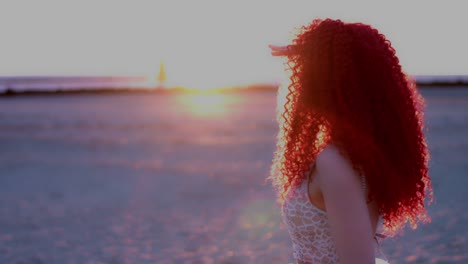 4k-Shot-of-a-Redhead-Bride-on-the-Beach