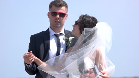 Wedding-couple-in-sunglasses.