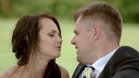 Groom-and-bride-kissing.
