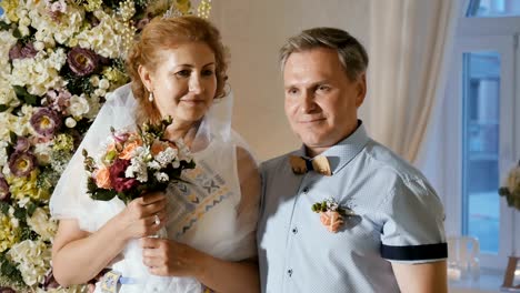 Happy-bride-with-groom-at-wedding-ceremony