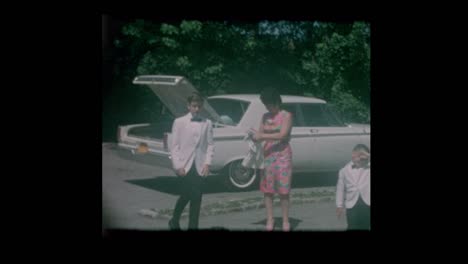 1960's-Dressed-Formal-family-arrives-for-wedding