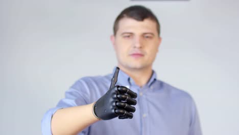 Man-with-Prosthetic-Arm-Showing-Thumbs-Up