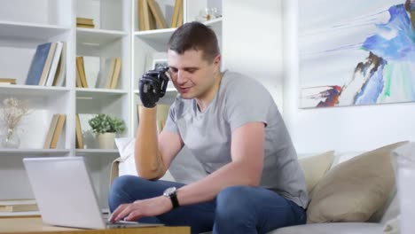 Man-with-Prosthetic-Arm-Chatting-on-Phone