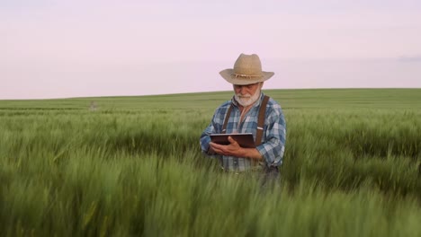 Farmer-Uses-A-Digital-Device.-Agriculture,-Farming-Concept.