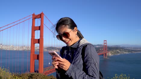 girl-sending-photo-on-social-media-mobile-phone