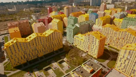 Panorama-cozy-comfortable-colorful-buildings-in-a-European-city-4K-UHD-aerial