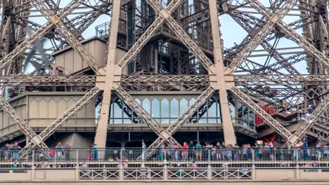 Close-up-view-of-first-section-of-the-Eiffel-Tower-timelapse-in-Paris,-France