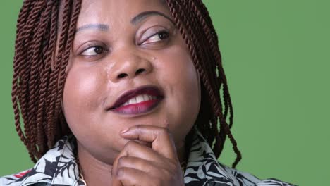 Overweight-beautiful-African-woman-against-green-background