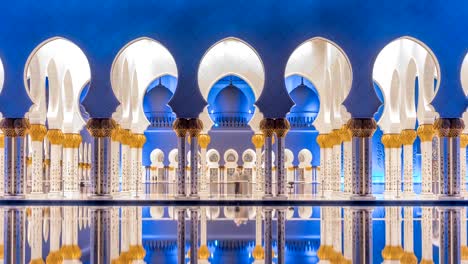 Sheikh-Zayed-Grand-Moschee-beleuchtet-bei-Nacht-Zeitraffer,-Abu-Dhabi,-Vereinigte-Arabische-Emirate