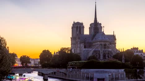 Rear-view-of-Notre-Dame-De-Paris-cathedral-day-to-night-timelapse-after-sunset