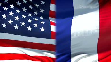 United-States-and-France-flags-background,-diplomatic-and-economic-relations