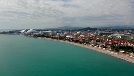 Aerial-video-shooting.-Panorama-shooting.-Mountains-of-the-Caucasus-range.-City-resort.-Recreation-area.-Imereti-district.-The-black-sea-coast-of-Sochi,-Russia.