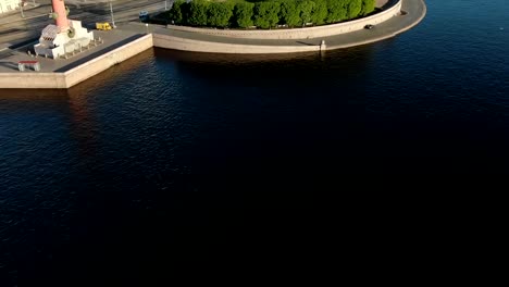 calm-deep-blue-river-between-city-parts-bird-eye-flight