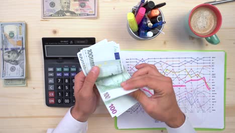 Accountant-counting-euro-notes