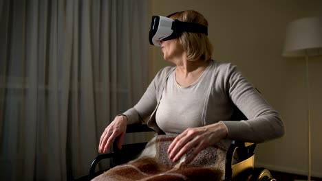 Woman-in-wheelchair-wearing-vr-headset-for-the-first-time,-happy-and-surprised