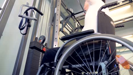 Power-load-for-disabled-man's-weak-back-muscles-in-a-wheelchair.