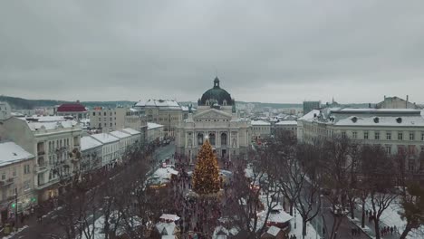 Lviv,-Ukraine.-Arial-shot.-Opera-house.-Christmas-tree.-Christmas-Fair.-People-are-walking-around-the-city-center.-Winter