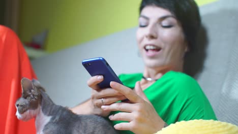 smartphone-in-the-hands-of-a-girl-who-emotionally-writes-a-message