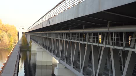 Unfinished-bridge-against-the-background-of-the-silhouette-of-the-city.-Unfinished-highway-away-city