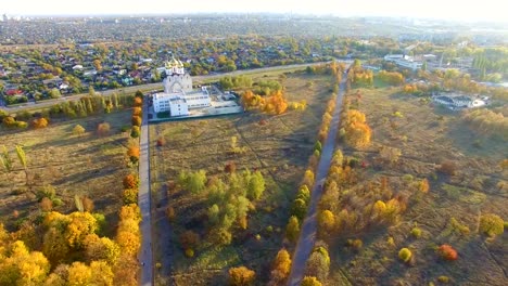 Aerial-view-to-Orthodox-church-in-park-in-Kharkiv,-Ukraine