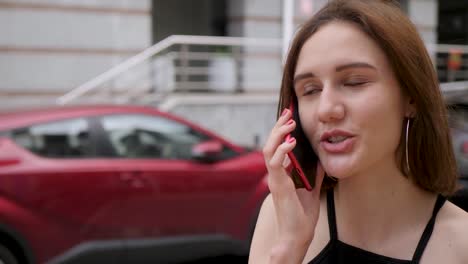 Girl-speaks-on-a-red-phone