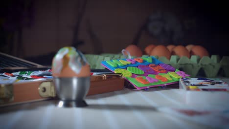 4K-Home-Shot-Of-Child-Painting-Easter-Eggs