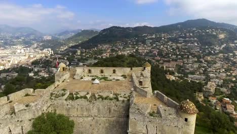 Aerial-view-of-stone-wall-of-ancient-bastion-in-port-of-Menton,-French-riviera