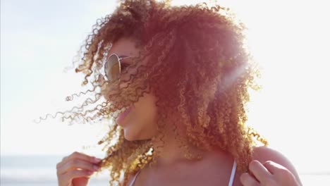 Portrait-of-plus-size-Ethnic-female-on-beach