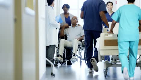 African-American-male-in-wheelchair-consult-with-doctor