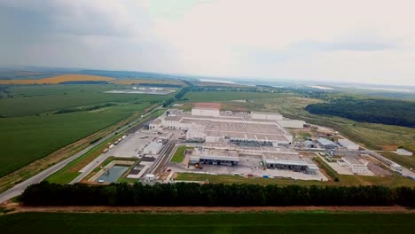 territory-of-the-woodworking-plant-from-above-on-the-background-of-the-countryside.