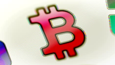 Die-Bitcoin-Symbol-auf-dem-Bildschirm.-Looping.