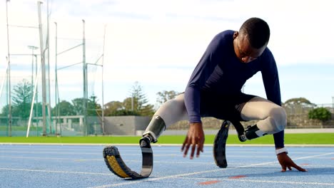 Disabled-athletic-exercising-on-a-running-track-4k