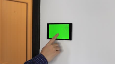 Smart-home-control-device-on-a-wall