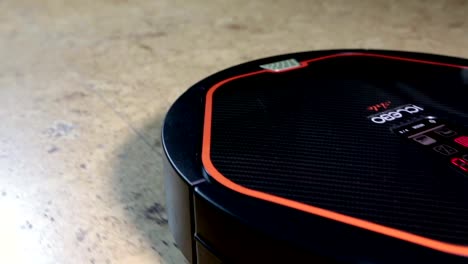 the-robot-the-vacuum-cleaner-cleans-a-floor