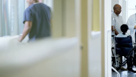 African-American-female-in-wheelchair-consult-with-doctor