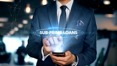 Businessman-With-Mobile-Phone-Opens-Hologram-HUD-Interface-and-Touches-Word---SUB-PRIME-LOANS