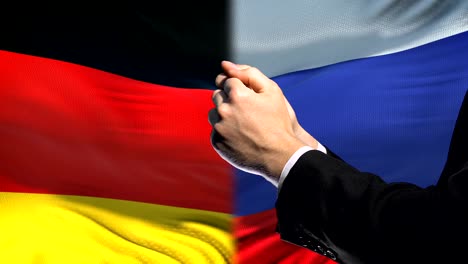 Germany-sanctions-Russia,-chained-arms,-political-or-economic-conflict,-ban