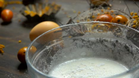 Sugar-powder-is-poured-into-a-bowl