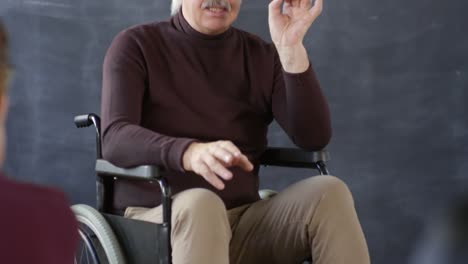 Disabled-Professor-Discussing-Topic-with-Students