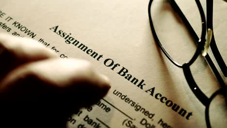 Finger-tapping-on-assignment-of-bank-account